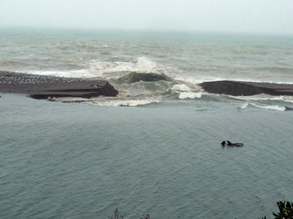 Gualala River mouth opens during heavy rains, January 20, 2012 at 11:00 a.m.